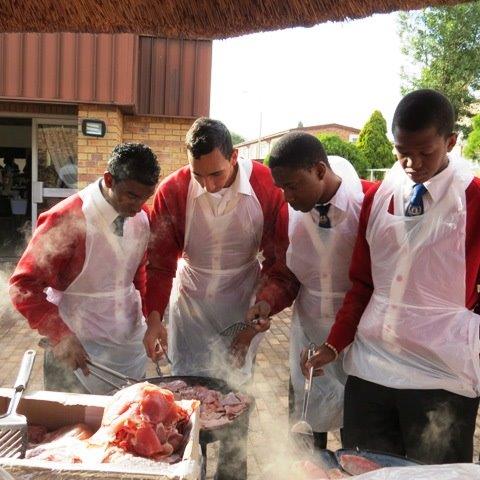 RCL members making breakfast at an old age home with the Lions of SA (Roodepoort) - May 2013
